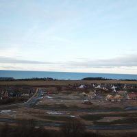 Luftbild von Bauflächen in Drankse mit Blick aufs Wasser